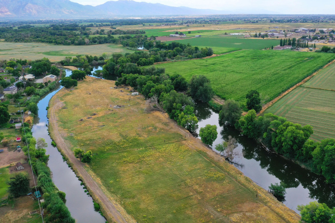 The Weber River and Warren Canal wind through Weber County on Wednesday, July 26, 2023. Brad Blanch is a West Weber resident who wants to lease several hundred acre-feet of water to benefit the Great Salt Lake. Jeffrey D. Allred, Deseret News